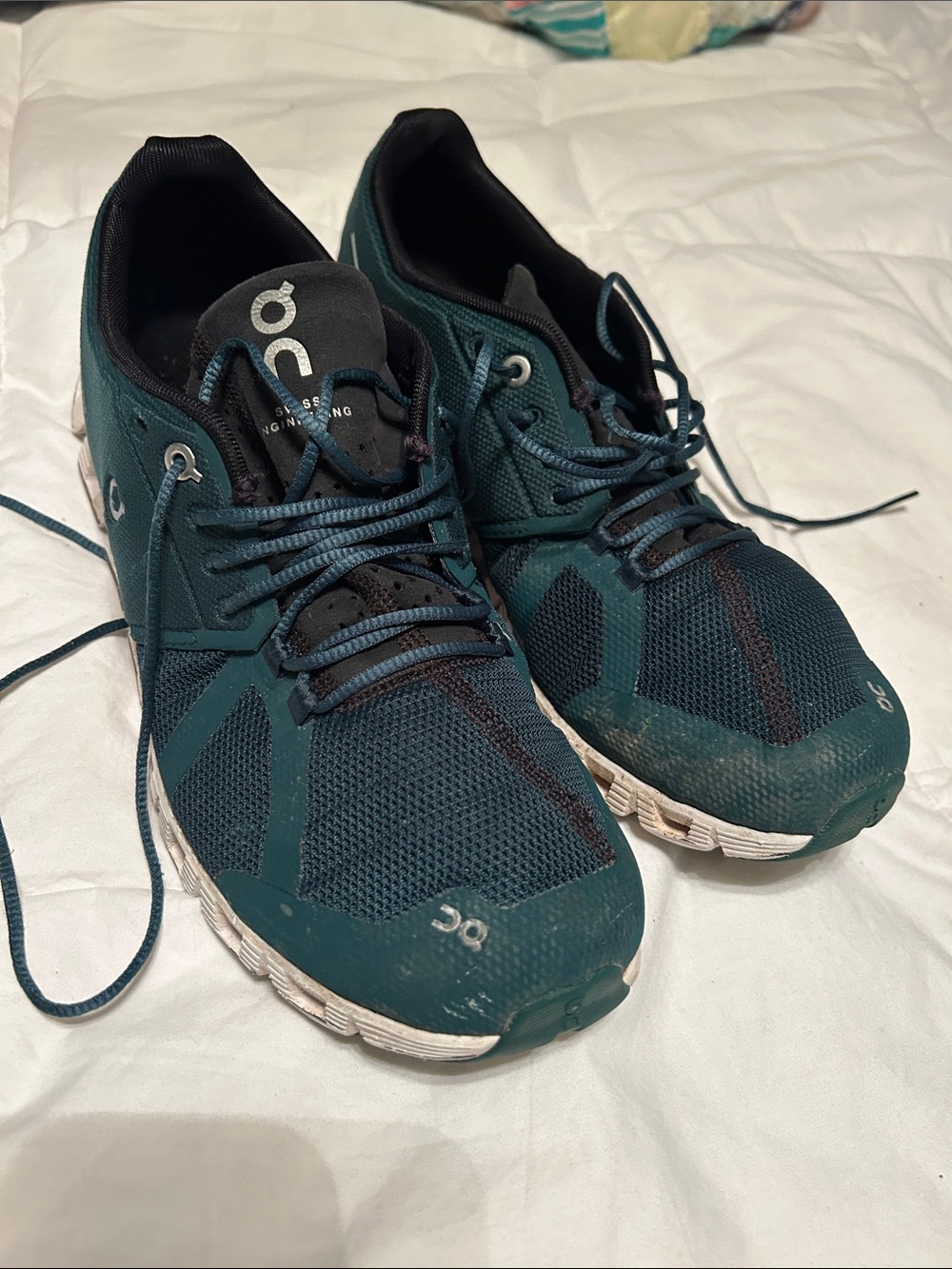 On cloud Running womans Performance Trainers in green and Black
